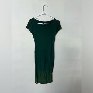 Dark green dress with mesh overlay.
